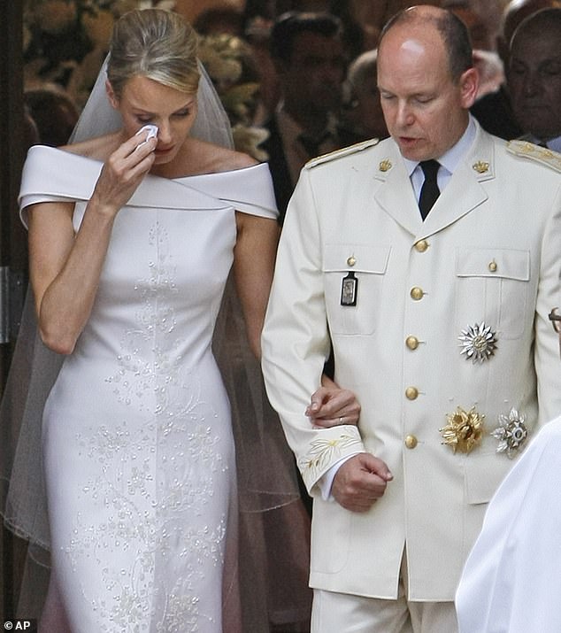 Charlene, Princess of Monaco, wiped away a tear as she left St. Devote Church after her wedding to Prince Albert II on July 2