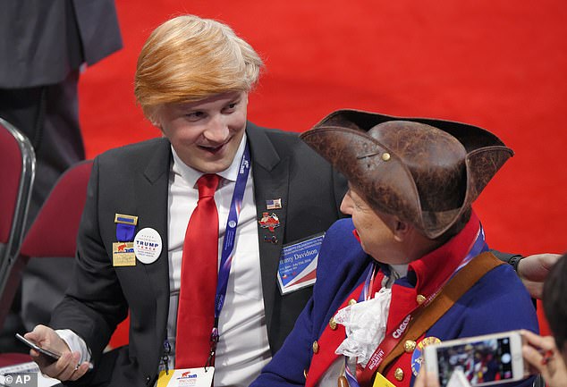 Massachusetts Rep. Jimmy Davidson wears a Donald Trump-style wig at the 2016 RNC