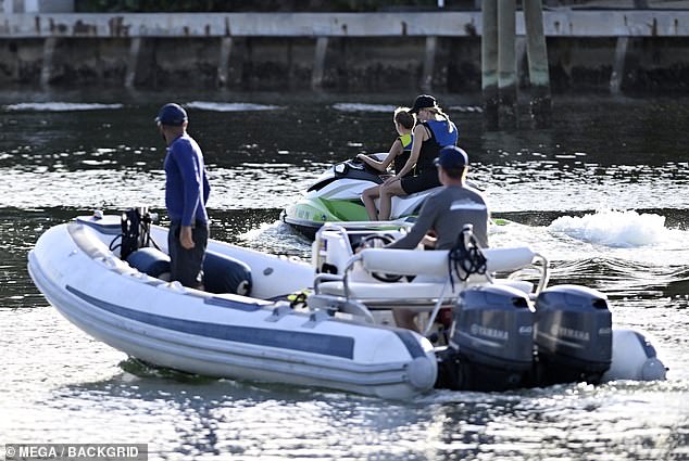 The couple were surrounded by private security and police during the outing