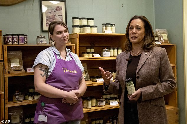 Democratic presidential candidate Vice President Kamala Harris, right, is seen during a campaign rally at Penzeys Spices in Pittsburgh