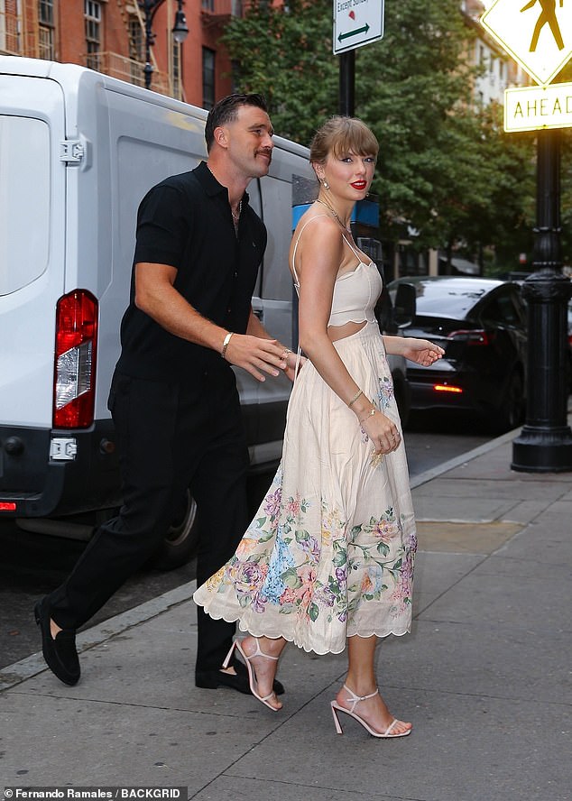 Meanwhile, the athlete completed Swift's stylish ensemble, looking elegant in a Vivienne Westwood outfit consisting of a black short-sleeved shirt, with matching trousers and loafers