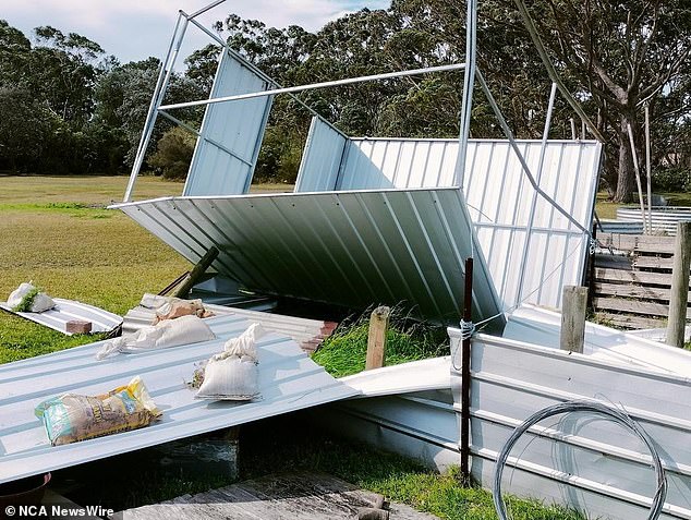 NSW saw property damage from heavy winds and residents are being warned to be prepared for all weather conditions (Pictured: A destroyed shed on a property in NSW in early September)