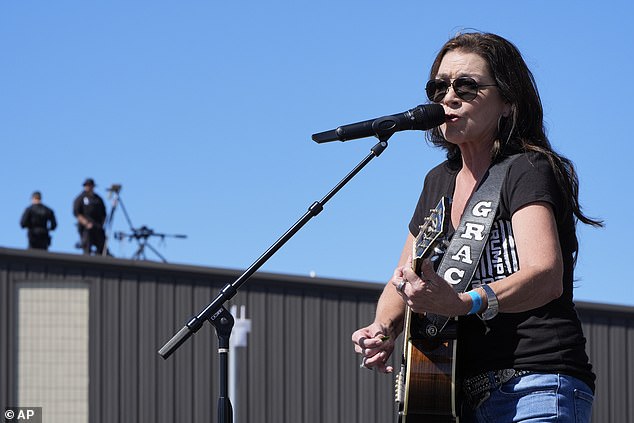 Country singer Gretchen Wilson opened the event and gave the Republican her support as Secret Service snipers watched from nearby rooftops.