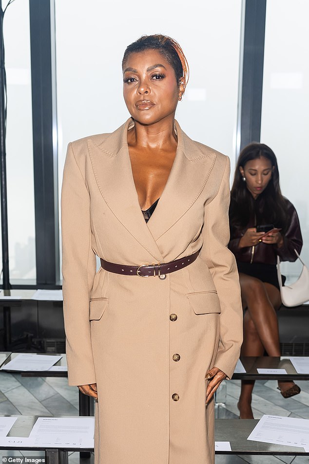 The 53-year-old The Color Purple actress wore a long beige blazer dress that highlighted her black bra