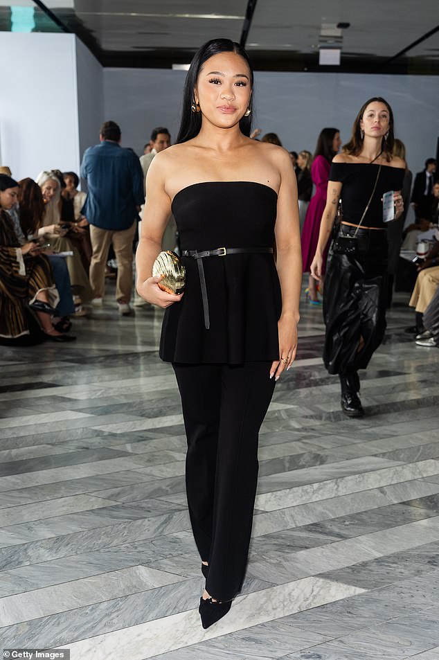 Olympic gold medalist Suni Lee put on an elegant show in a strapless flowy top paired with black trousers