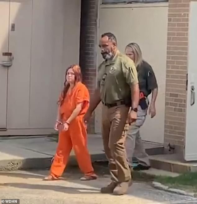 The suspect is currently being held in the Geneva County Jail, where she reportedly told a family member during a phone call that 