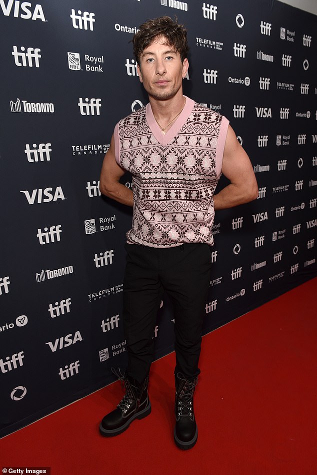 For the premiere of Bird, Keoghan changed into a pink knitted sweater and brown boots