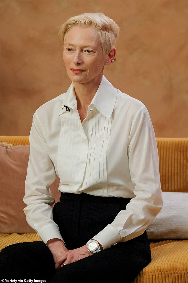 Scottish actress Tilda Swinton, 63, was dressed almost identically to Anderson in a white blouse and long black skirt