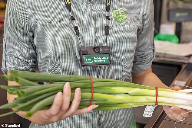 Woolworths has spent $40 million on security upgrades to ensure the safety of its team members, including body cameras (a Woolworths employee is seen wearing the security camera here)