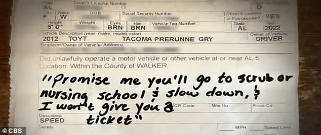 She showed him the ticket he had written, which she had kept in her glove compartment since the stop.