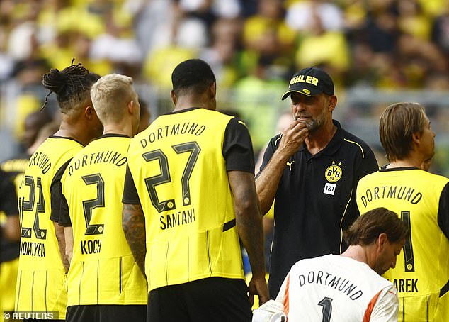 The 57-year-old took charge of a team featuring Dortmund legends and was met with a roaring reaction from the fans in attendance