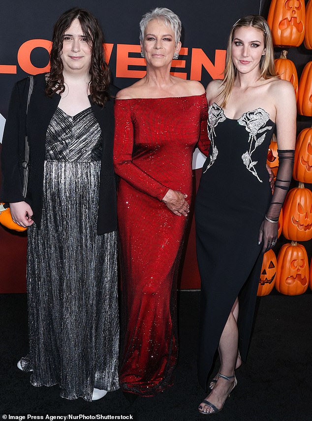 Actress Jamie Lee Curtis with her daughters Ruby, left, born Tom, and Annie at the Halloween Ends premiere in 2022