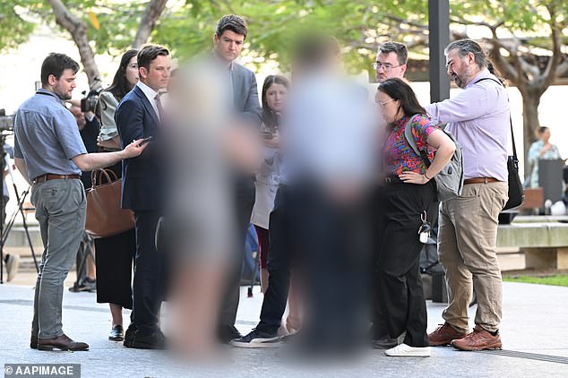 Griffith pleaded guilty in Brisbane District Court on Monday to 307 child sex offences. The parents of one of his victims are pictured outside court