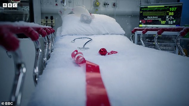 The classic Pogues song Fairytale of New York plays in the background as a hand removes a blood bag with a Christmas bow from a refrigerator