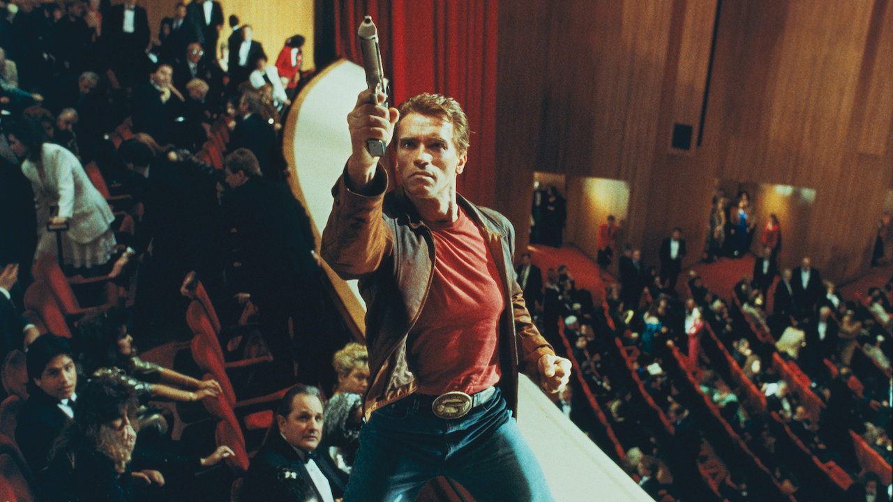 Arnold Schwarzenegger as Jack Slater in The Last Action Hero.