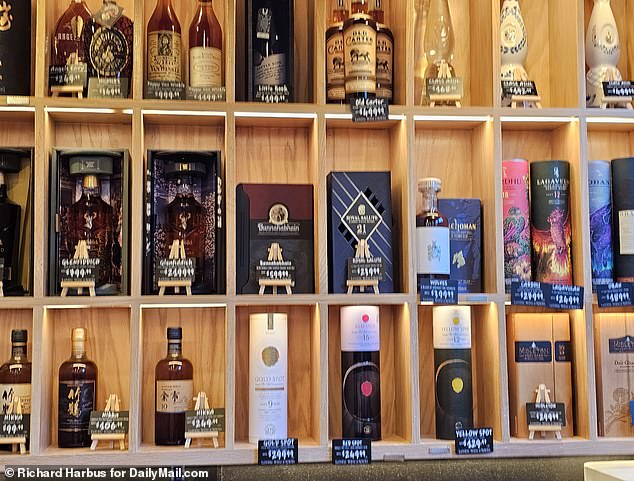 The most expensive items were displayed behind the counter, including a bottle of Dalmore single malt whisky imported from Scotland, aged 30 years and priced at a staggering $5,200