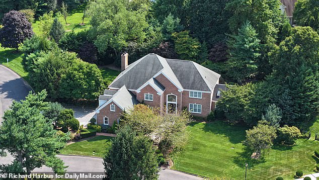 The couple's $4 million mansion, located in the exclusive Stone Hill development in Manhasset