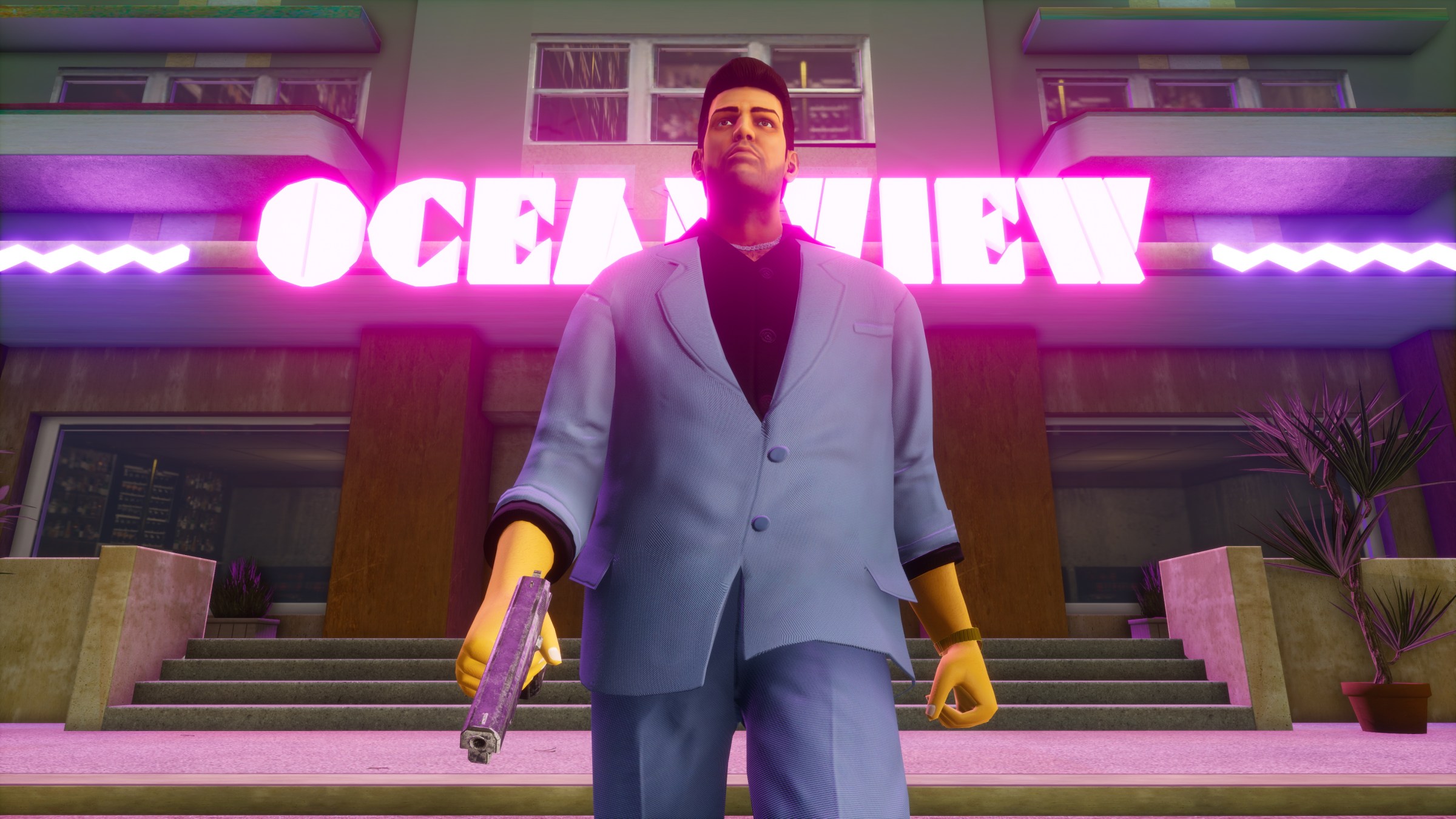 A man with a gun walks towards the camera with a neon sign behind him