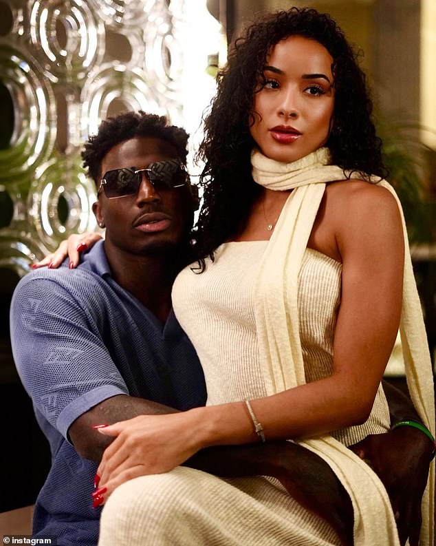 The Dolphins receiver is pictured with his wife Keeta, whom he married last November