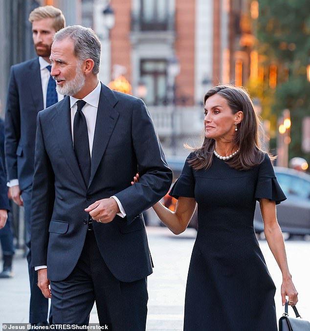 Queen Letizia paired her understated dress with a pearl necklace and matching earrings