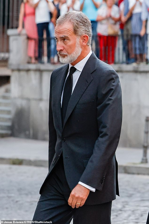 King Felipe wore a black suit with a white shirt and a black tie for the occasion