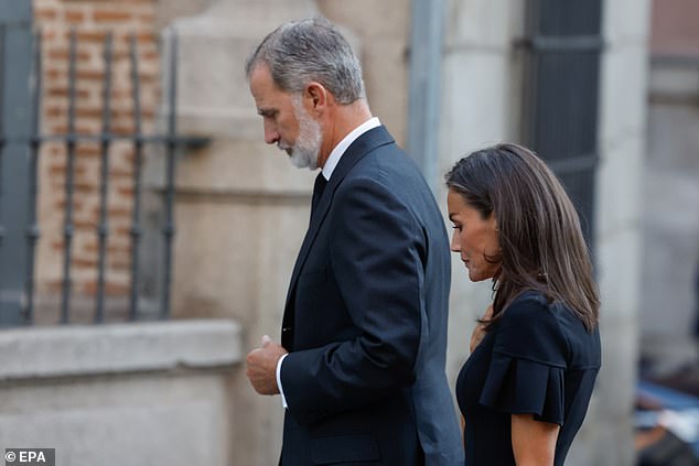 King Felipe and Queen Letizia both bowed their heads as they paid their respects