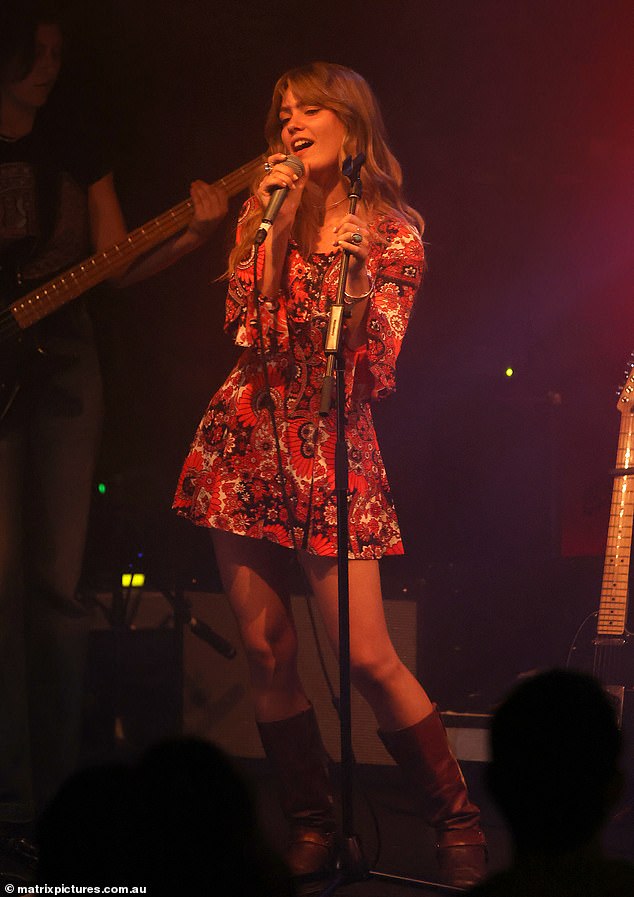 She let her brown hair hang loosely over her shoulders and appeared to be having the time of her life as she performed for the crowd.