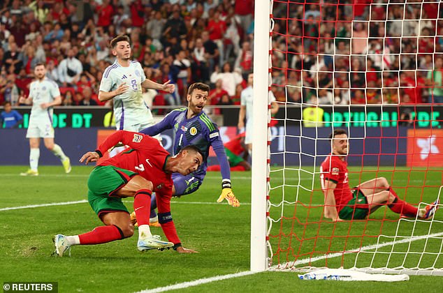 It's a crushing blow for Scotland when Ronaldo heads the ball home in the 88th minute