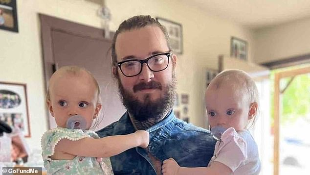 The 2-year-olds were found after Norman police responded to a request for a welfare check from a driver who saw the car stopped in the 1000 block of W Brooks Street. (Pictured: Ariel and Avery with their father Marshall Suter)