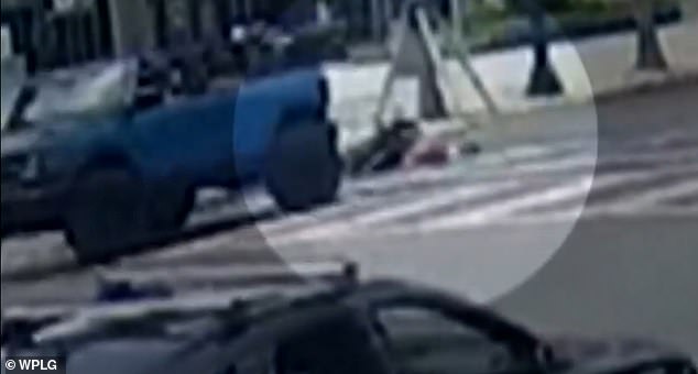 Cameras captured the moment the blue Ford Bronco driven by Demarcus Harrington struck Khedr's electric bike, sending her head-first into the curb