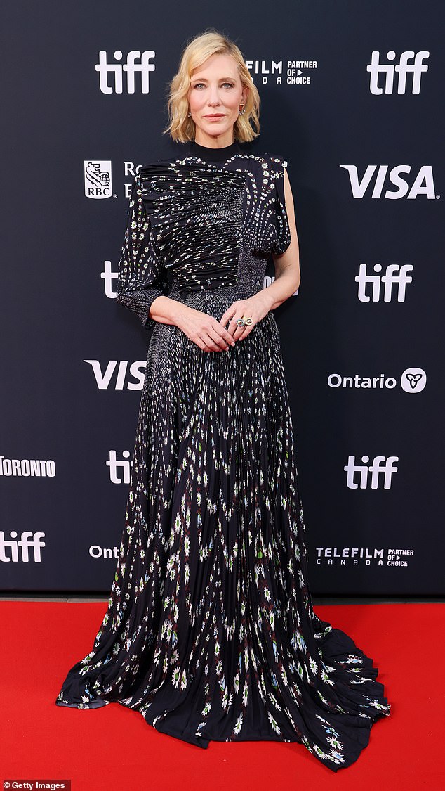 Cate Blanchett, 55, brought her tasteful fashion sense in an asymmetrical black and white floral dress