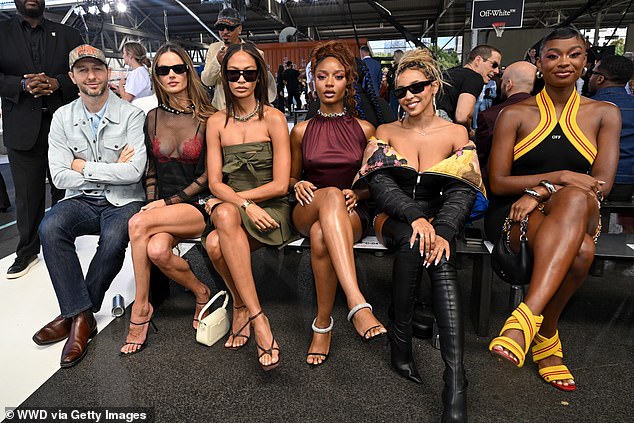 Later in the evening, Alessandra sat front row for Off-White's debut show during New York Fashion Week in Brooklyn Bridge Park (pictured L-R Derek Blasberg, Alessandra, Joan Smalls, Ayra Starr, Tinashe and Coco Jones)