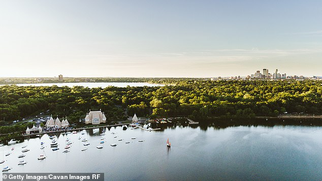 Summers in Minneapolis are not extremely hot, with temperatures averaging around 80°F (Pictured: Lake Harriet and the Minneapolis skyline)