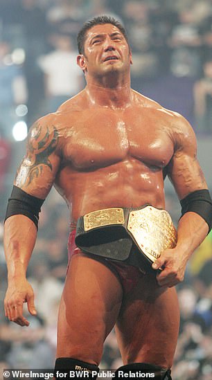 He finally escaped poverty in his 30s, when he began his hugely successful career in professional wrestling; pictured at WrestleMania Goes Hollywood in Los Angeles in 2005