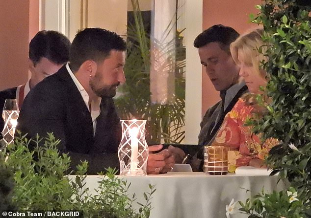 The star kept it clean as he opted for a smart suit for his latest dinner, as he was seen sitting with friends