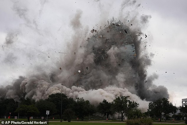 The skyscraper collapsed on Saturday in a large cloud of dust into a pile about five stories high