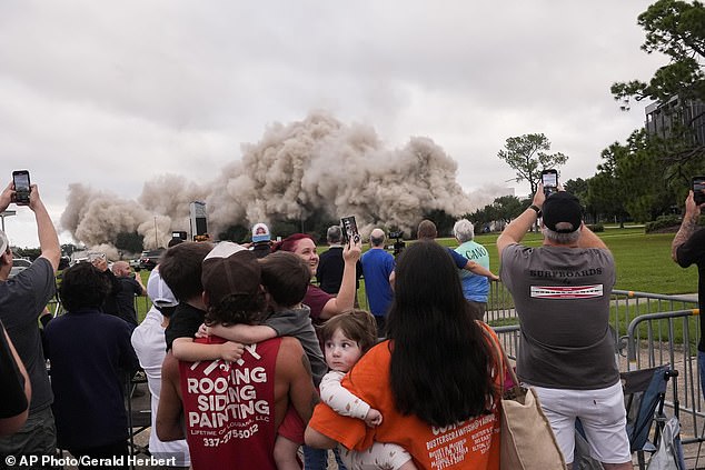 Tuff Gary, left, and Morgan LeBlanc watched the implosion of the Hertz Tower with their children Hudson, Tuff, Jr. and Zander on Saturday, September 7, 2024.