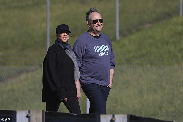 Vice President Harris and her husband Doug Emhoff take a walk in Pennsylvania, where Harris is staying as she prepares for the debate.