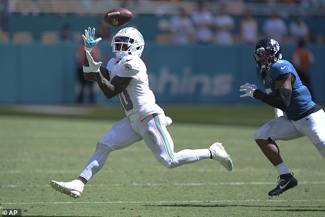 Hill then played and scored a touchdown in Miami's 27-20 victory over the Jacksonville Jaguars