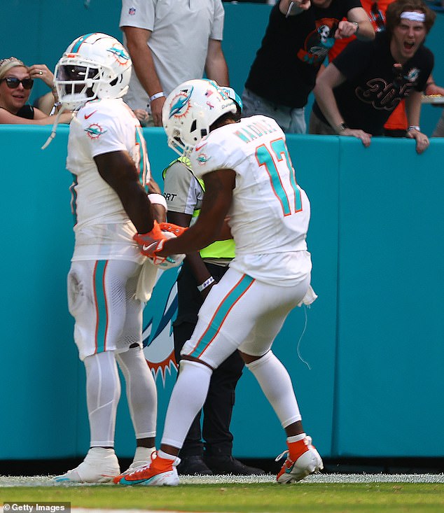 After scoring a touchdown, he celebrated by mimicking the moment he was handcuffed and arrested by police.