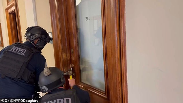 NYPD riot police have released dramatic video showing them storming occupied Hamilton Hall at Columbia University