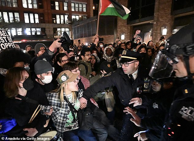 Carlson was one of about 40 protesters arrested on the first floor of Hamilton Hall at Columbia University after police stormed the building to break up the pro-Palestine encampment that had gripped the campus for nearly two weeks. Similar protests were taking place simultaneously on nearby campuses (including NYU, pictured)