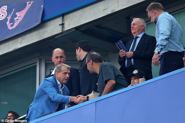 Boehly (left) regularly attends Chelsea matches at Stamford Bridge to keep a close eye on things