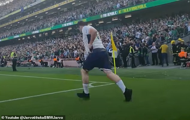 Jarvis makes his move by sprinting onto the pitch after unveiling his full England kit