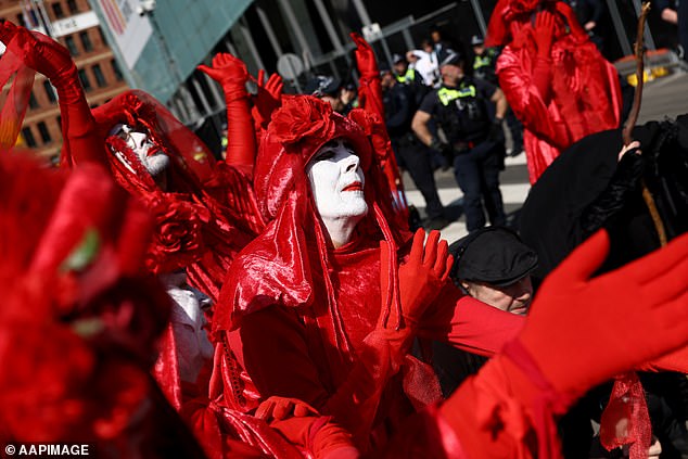 Hundreds of pro-Palestine protesters and members of activist group Extinction Rebellion (pictured) are expected outside the Melbourne Convention and Exhibition Centre to protest the 2024 Land Forces International Land Defence Exposition