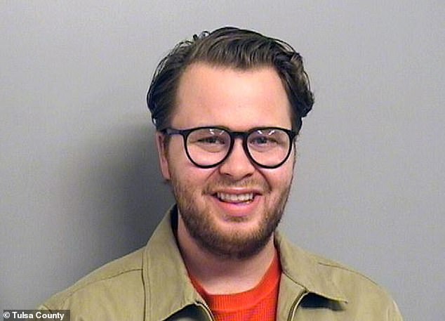 Pictured in a 2018 booking photo following his arrest on charges of molesting a five-year-old child