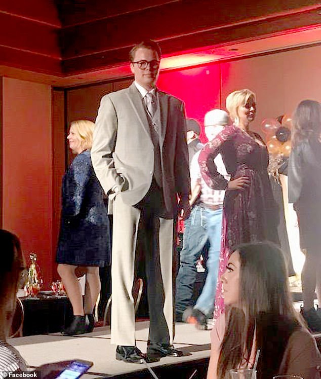 Scott is seen at a 2017 fashion show to raise money for the Children's Abuse Network