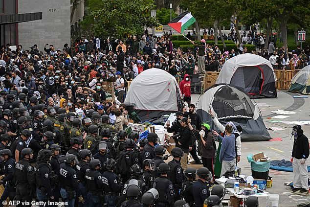 Students built camps on campus, and eventually police were called in to dismantle them