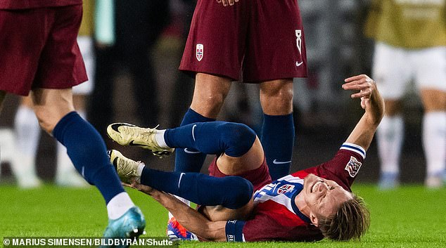 The midfielder appeared to be in mortal fear after a sliding tackle from Christoph Baumgartner