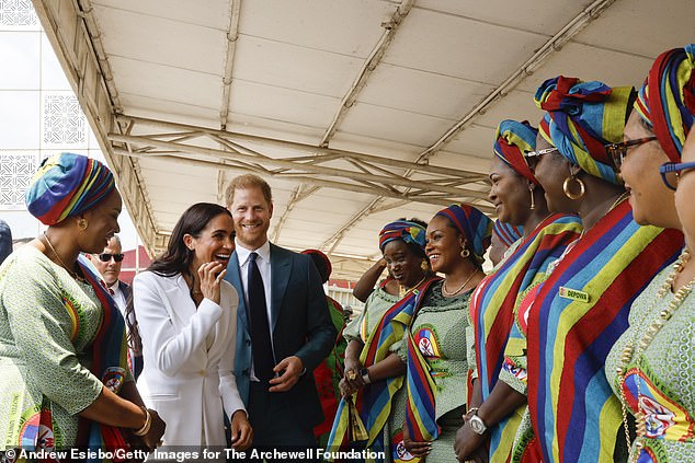 Prince Harry and Meghan Markle at the Defence Headquarters in Abuja, Nigeria, on May 10